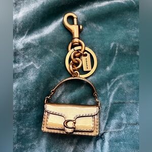 NWOT Coach Tabby Charm - Gold